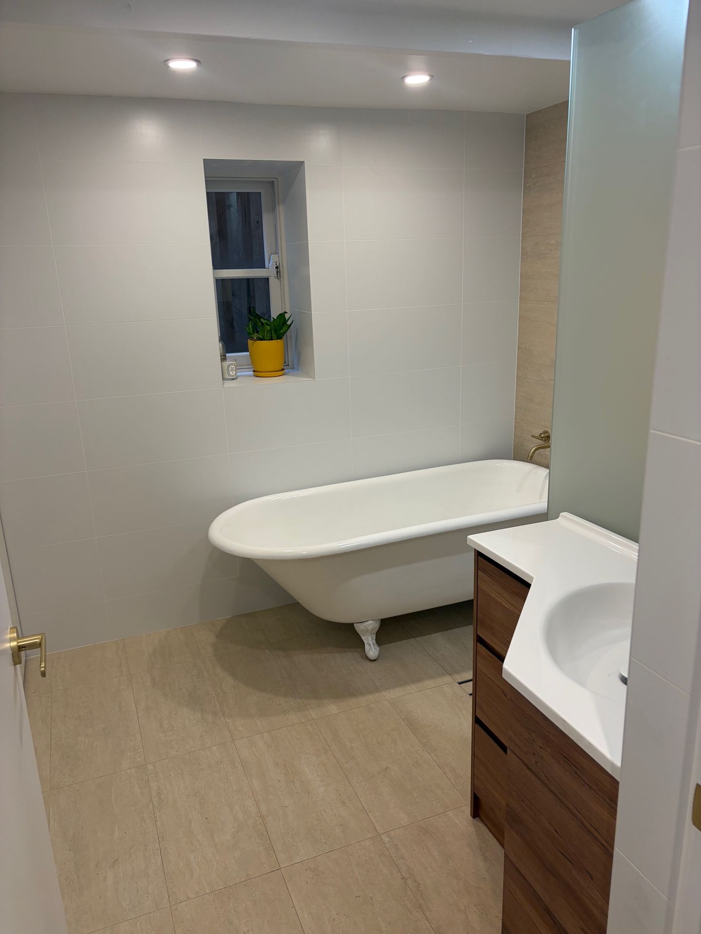 Modern timber vanity with vessel sink installed