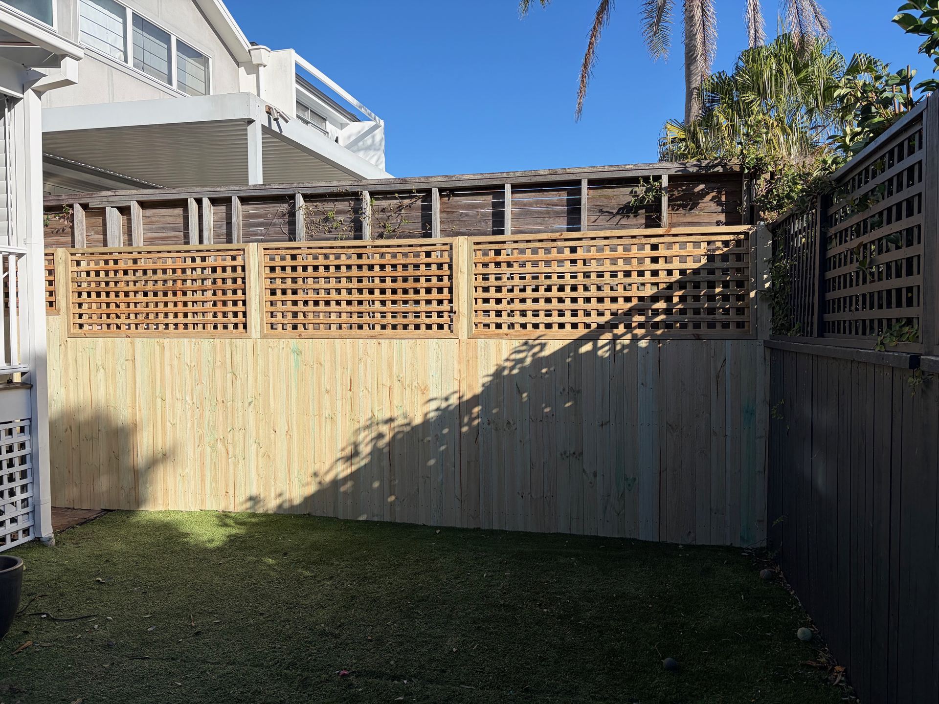 Newly built timber fence and lattice screen completed by Vig Constructions